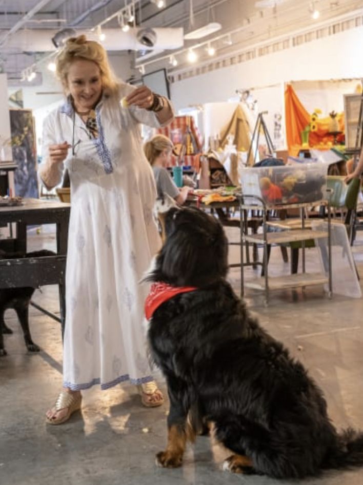 Lisa in the studio with her dog